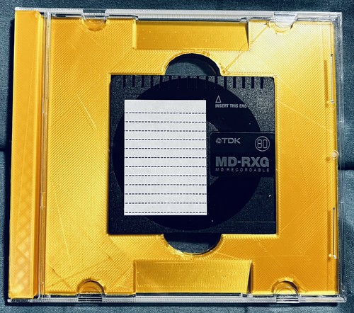 Case with mini - disc, insert