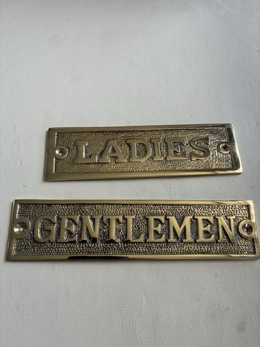 Ladies and gentlemen toilet - and,