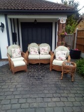 Real Rattan conservatory 3 piece suite with table and footstool.