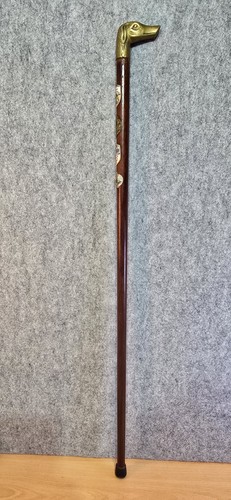 Wooden walking stick with - , a