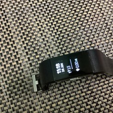  Fitbit Charge 2 with charger small hairline crack on screen. Good overall.