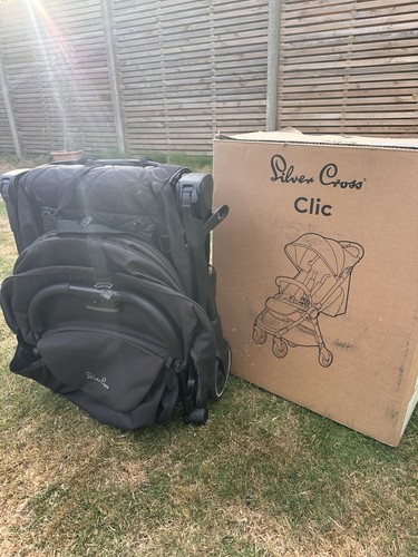 Silver cross clic stroller and - cross,