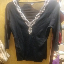 vtg Leo guy.Black Jumper