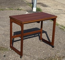 Mcintosh 1960/70’s Teak Side Table with fold over extendable top on castors