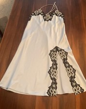 Reger- Dove grey silky lingerie slip with black lace trim, side split