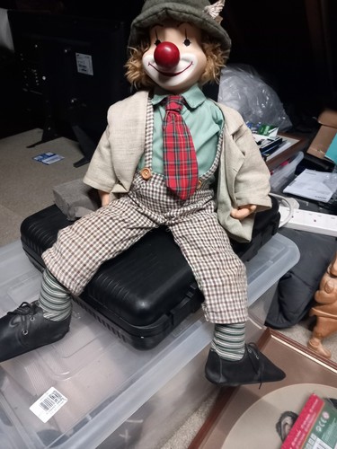 Lovely sitting clown - sitting,