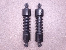 Progressive suspension strut