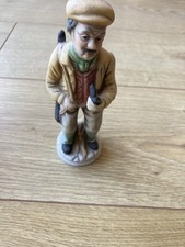 Old man with a gun and a pipe, figurine, ornament, vintage