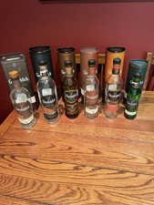 6 Assorted Empty Bottles Of