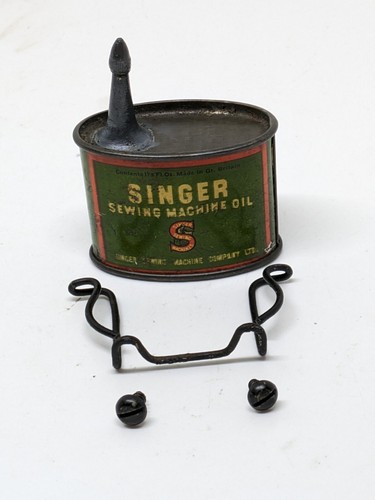 Tiny vintage oval singer - vintage,