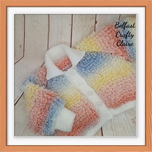 Hand knitted baby loopy - hand,