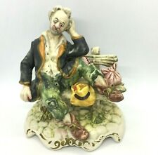 Figurine tramp old man on