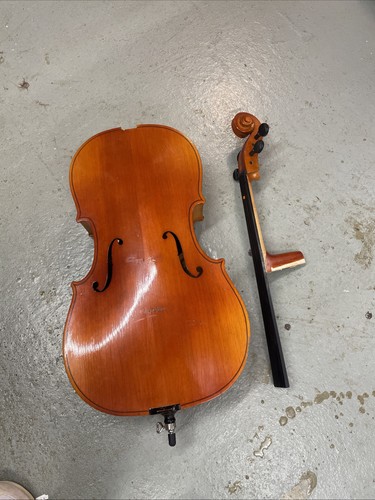 Broken cello - broken,