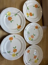 Five Bovey Pottery Tea Plates