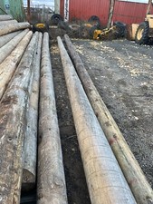 long wooden poles Structure Shed Logs Building Kindling Pole Barn Farm Building