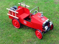 Classic Fire Engine Toddlers pedal car with detachable ladders and Bell. Mint