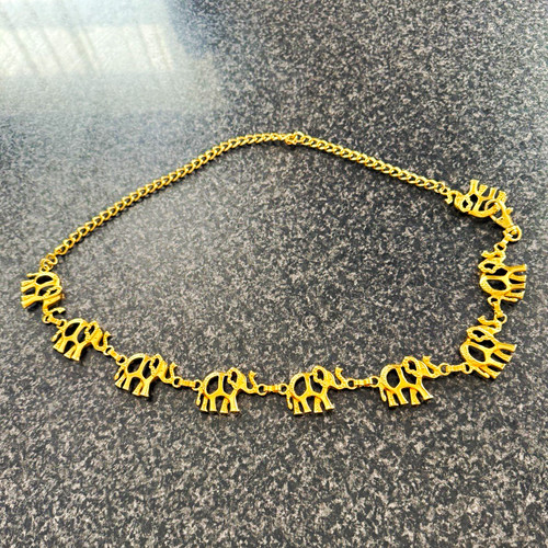 Gold metal elephant - gold,
