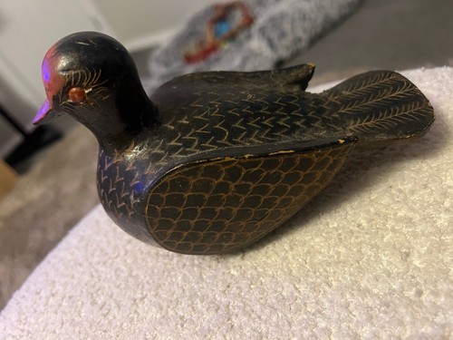 Hand carved dark - wood, mid