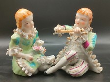 Pair of 1950s Porcelain Figurines – Flute Player and Lady with Flower