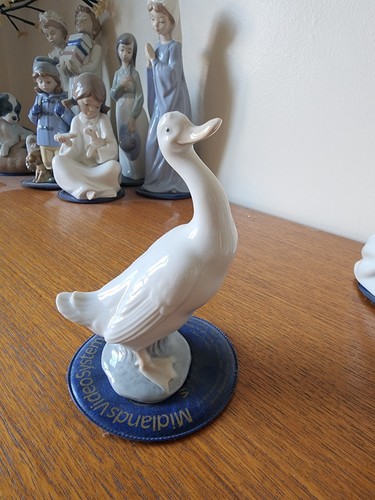 Nao lladro porcelain - by,