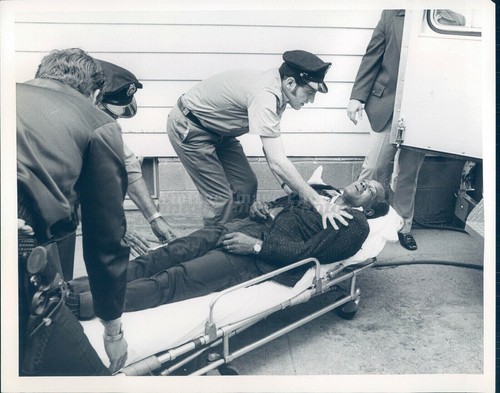 1970 police officers stretcher - police,