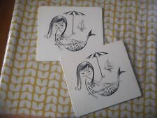 Two Arnold Designs French retro place mats.