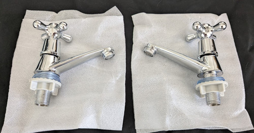 Pair pillar taps - a, of