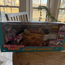 Grand Champions Feed 'N Nuzzle