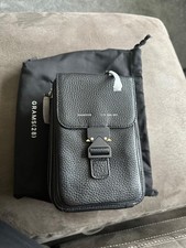 compact black leather sling bag