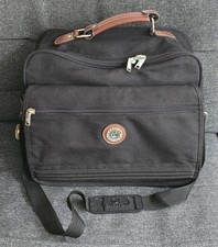 Black Carlton International Travel Bag with shoulder strap & multiple pockets.