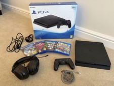 Sony PlayStation 4 Slim 500GB With Headphones and 4 Games