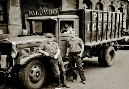 Three workmen around palumbo - three,