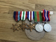 nice old lot 5 WW2 medal on a