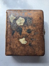 Antique photos in Victorian photo album