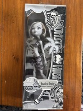 Monster High Skull Shores Frankie Stein Doll Black White with Silver Stand