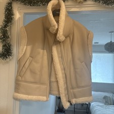 Cream faux fur shearling lined