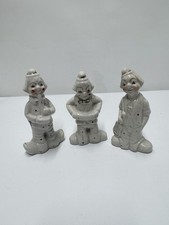 set of vintage ceramic clown