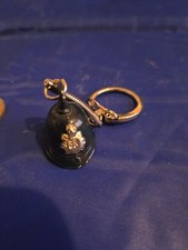 Unusual metal keychain in the shape of a police helmet,Queen Elizabeth Cypher