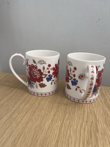 Pair matching china cups by - pair, of