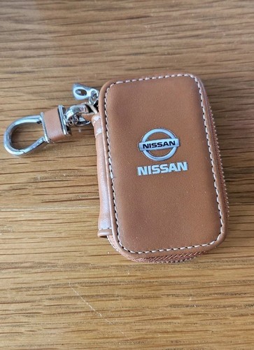 Brown nissan keyring - 1,