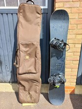 Forum Stomper 57 Snowboard With Salomon Bindings / Burton 166 G Case With Wheels