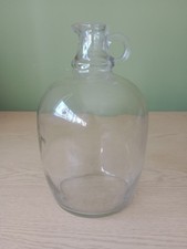 Glass Demijohn Bottle Pouring
