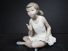 Nao by Lladro Sitting Cross Legged Attentive Ballerina