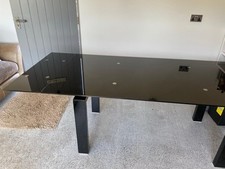 Smoked Glass Extending Dining Table.