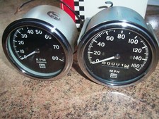 stewart warner 160 MPH speedometer and 8,000 tachometer ac cobra