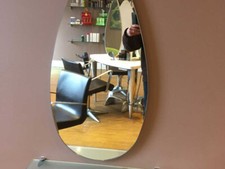 Tear drop wall mirror from hair salon. White wood backing for hanging