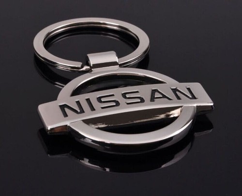 Vintage metal nissan keyring - metal,