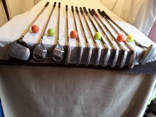 HIPPO DRIVER; KING COBRA 3 & 5 WOODS; MIZZUNO IRONS; PUTTER; LADY R/H