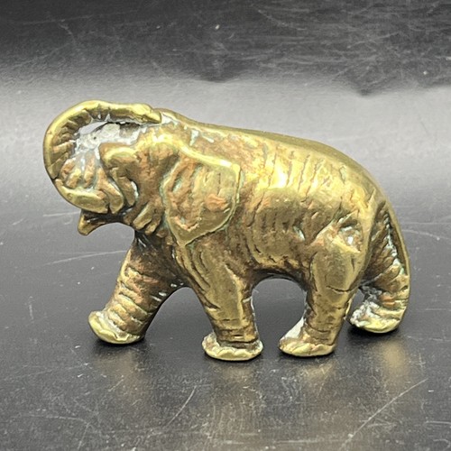 Small brass elephant figurine - brass,