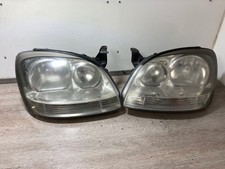 2005 NISSAN ALMERA PASSENGER & DRIVER SIDE FRONT HEADLIGHTS PAIR